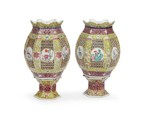 A pair of Chinese Famille Rose pierced lanterns and fixed stands, late 19th or first half of 20th century, decorated with rou