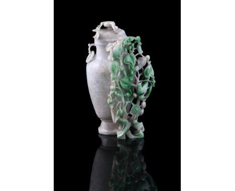 A Chinese jadeite vase and cover, circa Republican Period, with ring handles at the neck and with birds in vines, 27cm high P