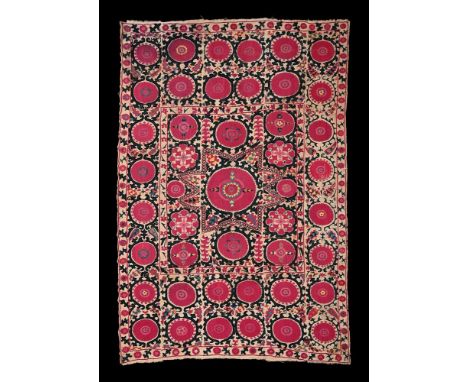 A Tashkent Suzani, Uzbekistan, circa 1900, silk embroidery on cotton ground, each panel worked in silk embroidery, comprised 