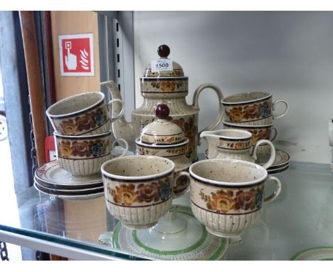A German Studio style coffee service to include milk jug, 6 cups, 6 saucers, sugar bowl and cream jug.