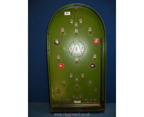 A vintage Bagatelle board (with spring loader), 29 1/2'' high x 15 1/4'' wide.