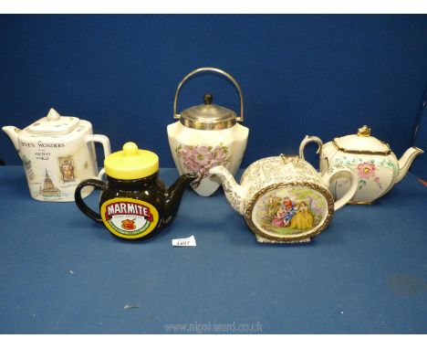 Four Teapots including Sadler, Marmite and Seven Wonders of The World and a Carltonware biscuit barrel.