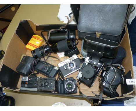 A Box of various Cameras and photographic equipment incl a Canon EOS 5000 Body, a Zenit EM 35mm SLR Camera with a Helios 58mm