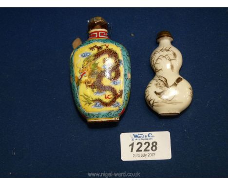 Two enamel oriental snuff bottles, with dragon decoration and character marks to base.