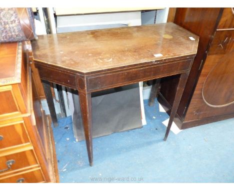 A 19th c. Mahogany flap-over Tea Table (top leaf missing) having light and darkwood stringing and standing on tapering square