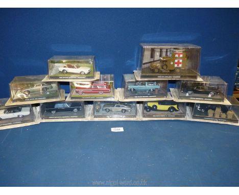 A box containing a quantity of 1:43 scale car models from 'The James Bond Car Collection', featured in the film 'Goldfinger',