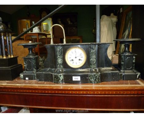 A black and green slate Clock and garniture set.