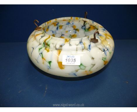 A glass multi-coloured ceiling light shade.