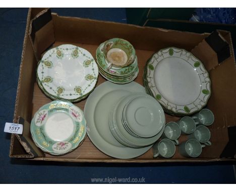 A quantity of Spode coffee cans and saucers, plates and a large plate in Flemish green, together with Royal Doulton cream and
