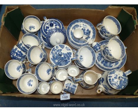 A quantity of Wedgwood 'Willow' pattern tea ware including breakfast and tea cups, coffee cans, saucers, tea plates, jug etc.