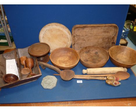 A quantity of Treen including bread board, rolling pin, cutlery tray, wooden bowls, pottery fragments, etc.