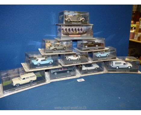 A box containing a quantity of 1:43 scale car models from 'The James Bond Car Collection', featured in the films 'Moonraker' 