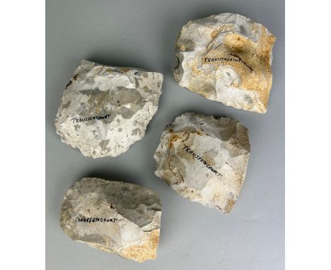 A COLLECTION OF FOUR LARGE NEOLITHIC TOOLS OR AXES FROM FRANCE (4) Largest 10cm x 10cm 