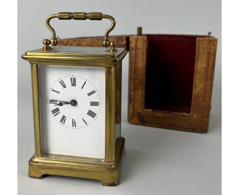 A FRENCH CARRIAGE CLOCK IN CASE 
