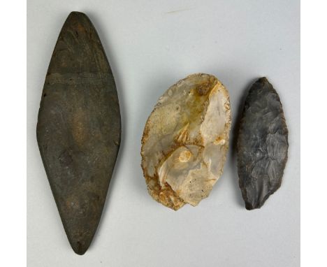 A COLLECTION OF THREE NEOLITHIC AXES, Two possibly British, the other European. London private collection. Largest 20cm L
