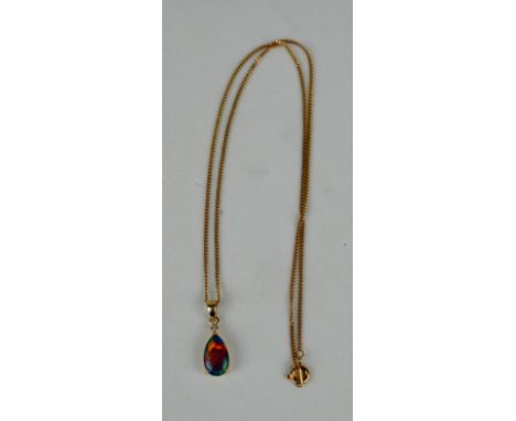 AN OPAL SET IN 9CT GOLD PENDANT WITH CHAIN, Weight: 3.37gms Opal 14mm x 9mm Chain and pendant length 240mm 