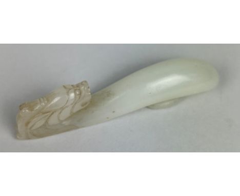 A 19TH CENTURY CHINESE JADE BELT HOOK WITH A DRAGONS HEAD,8.2cm L 