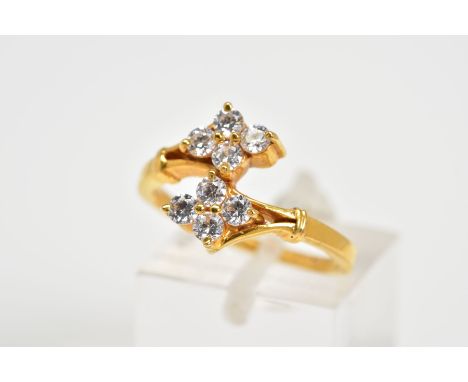 A MODERN CUBIC ZIRCONIA CROSSOVER DESIGN DRESS RING, ring size N, stamped '916', approximate gross weight 4.4 grams