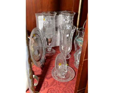 A PAIR OF CUT GLASS CANDLE HOLDERS, approximate height 33cm, a cut glass vase, a wheel etched vase, a vase with an air twist 