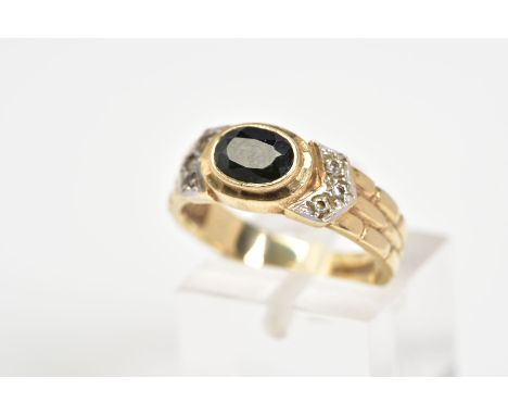 A 9CT GOLD SAPPHIRE AND DIAMOND RING, designed with a central oval cut sapphire within a collet mount, to the diamond detail 