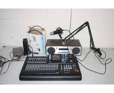 A TASCAM DP32SD DIGITAL PORTA STUDIO, with power supply and manual, a Soundmaster Hi Line radio with manual and remote, a My 