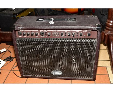 A LANEY LA65D ACOUSTIC GUITAR AMPLIFIER in the shape of a wedge monitor