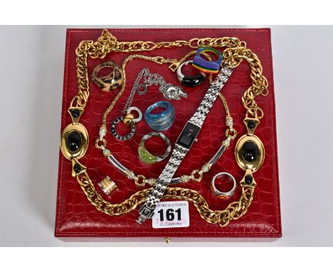 A SELECTION OF JEWELLERY, to include a large yellow metal double curb link chain with enamel detail, five chunky glass rings,