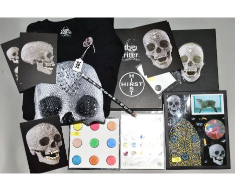 DAMIEN HIRST (BRITISH 1965) COLLECTABLE ITEMS comprising 'For The Love of God' T-Shirt with postcards, pin badge and pencil i