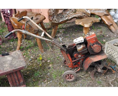 A VINTAGE GARDENCARE 5000 PETROL GARDEN TILLER, with a Briggs &amp; Stratton engine with two 35cm tilling blades, fitted and 