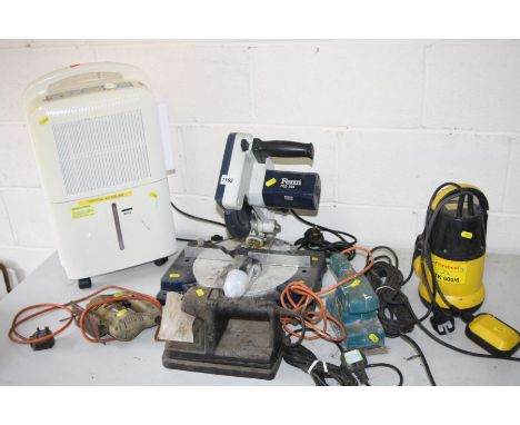 A FERM FKZ-205 COMPOUND MITRE SAW, (PAT pass, working), a Black &amp; Decker wallpaper stripper, a Black &amp; Decker orbital