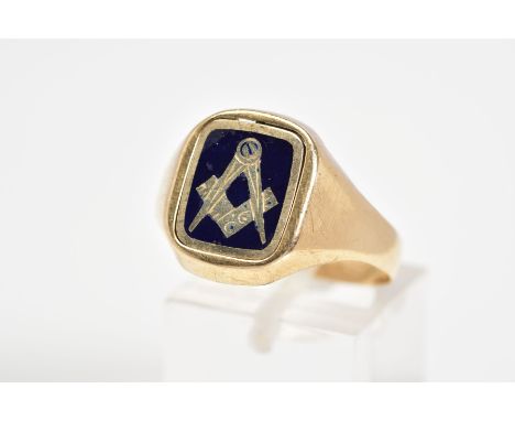 A 9CT GOLD MASONIC RING, designed with a square swivel panel with Masonic emblem finished with blue enamel, to the plain poli