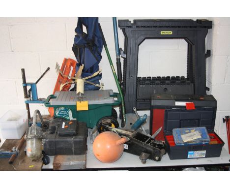 A COLLECTION OF HAND TOOLS AND MISCELLANEOUS, to include two plastic Stanley work horses, a manual drill press, a jack, a dec