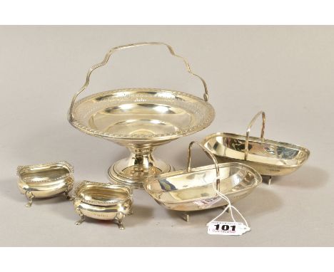 A PAIR OF EDWARDIAN SILVER GARDEN TRUG SHAPED BON BON DISHES, fixed handles, reg no 545848 and Z181655, maker James Dixon &am