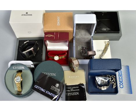 A NUMBER OF BOXED WRISTWATCHES, to include a gold plated and mother of pearl dial Citizen Eco drive, set with a single cut di
