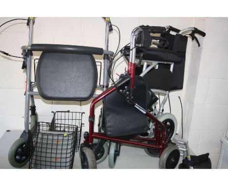 A DAYS FOLDING ALUMINIUM WHEELCHAIR, with foot attachments, together with a folding walker with basket and another folding wa