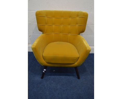 A MODERN GOLD UPHOLSTERED BUTTON BACK LOUNGE CHAIR, buttoned back on cylindrical tapering legs&nbsp; Condition Report&nbsp; O