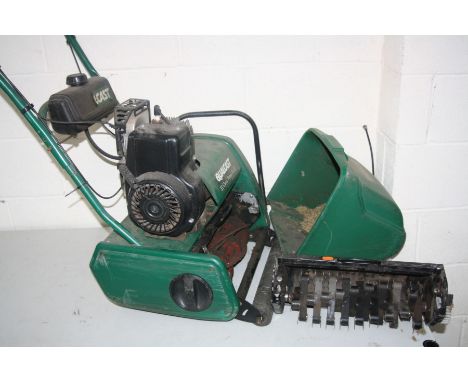 A QUALCAST CLASSIC PETROL 35S LAWN MOWER, (engine turning) with grass box and scarifier attachment (3)