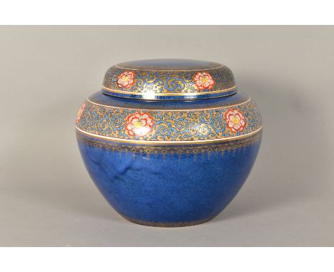 A LARGE WEDGWOOD BLUE WARE GINGER JAR, with a band of enamel scrolling foliage and flowers and gilt detailing, brown backstam