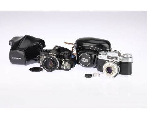 An Olympus OM-2 MD and a Contaflex 35mm SLR Cameras comprising an OM-2 MD camera with a non-original faux "snakeskin" body an