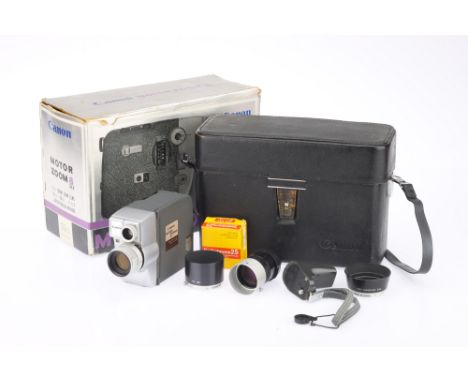 A Canon Motor Zoom 8 EEE 8mm Motion Picture Camera, grey &amp; silver, body G-VG, motor working when batteries are inserted, 