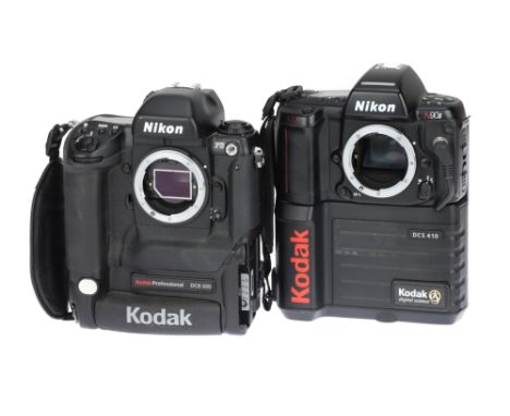 A Pair of Kodak DCS Nikon DSLR Camera Bodies comprising a DCS 620 body, 1999, based upon the Nikon F5 camera, no battery door