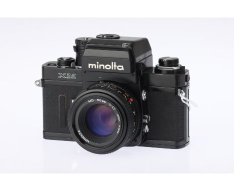 * A Minolta XM SLR Camera, black, serial no. 2116778, with Minolta MD f/1.7 50mm lens, body, G-VG, mirror not returning, lens