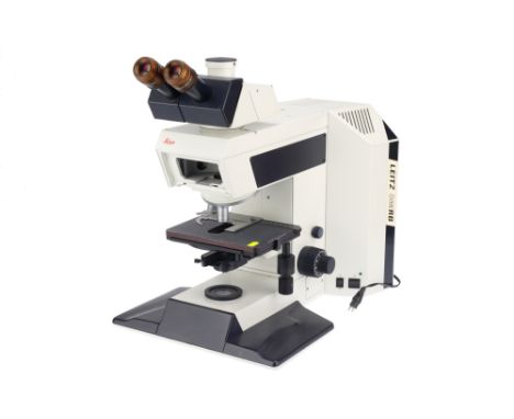Leitz DM RB Trinocular Microscope marked Leica Leitz DMRB, with lamp house, large mechanical stage with X-Y control, 7 object