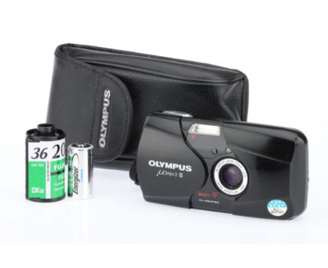 An Olympus mju-II Ultra Compact 35mm Camera black, with an Olympus f/2.8 35mm lens, body, G, powers up but when a photo is ta