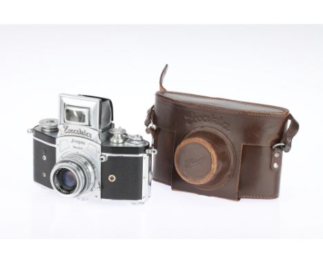 * An Ihagee Kine Exakta SLR Camera, chrome, serial no. 558811, with Carl Zeiss Jena Tessar f/2.8 50mm lens, body, VG, shutter