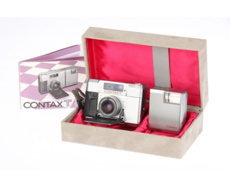 A Contax T Compact Rangefinder Camera outfit silver-grey, made by Kyocera, serial no.027316, with a Carl Zeiss Sonnar T* f/2.