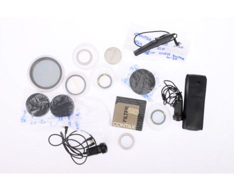 A Selection of Contax Camera Accessories, to include two Contax TVS metal lens hoods, a K-34 lens cap, a Contax 67mm Polar, a