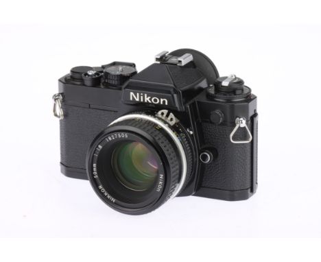 A Nikon FE 35mm SLR Camera black, serial no.3550778, with a Nikkor f/1.8 50mm AI lens, shutter won't fire but meter needle re