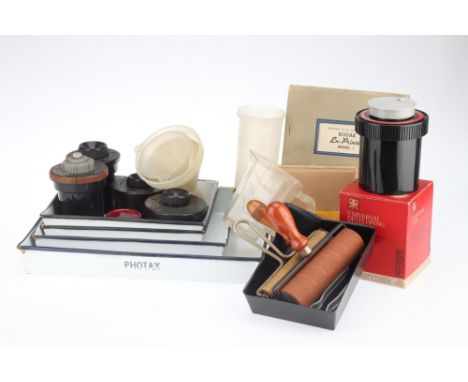 A Selection of Classic Film Developing Tools, to include a range of enamelled trays, some print rollers, four developing tank