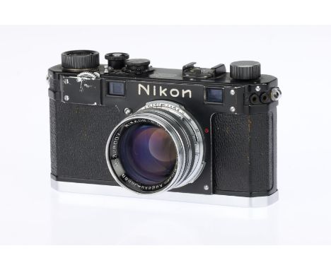 A Nikon S Rangefinder Camera, black repaint, serial no. 6125007, with Nikon Nikkor-S.C. f/1.4 50mm lens, body, F-G, shutter s